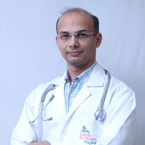 Dr. Ravikiran K